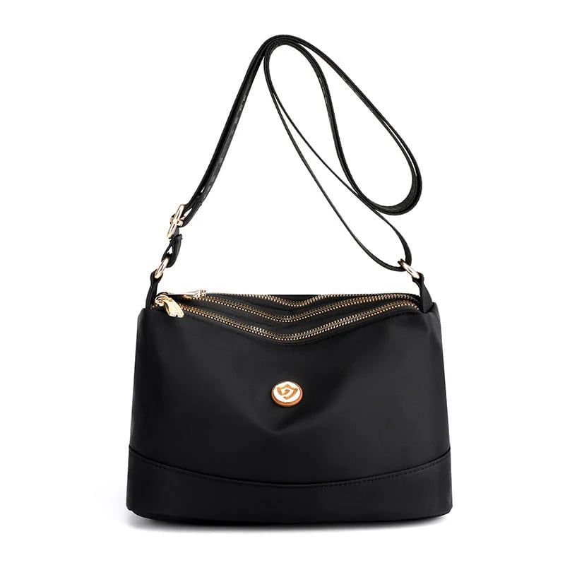 Minimalistisk axel- och crossbodyväska i nylon med stor kapacitet