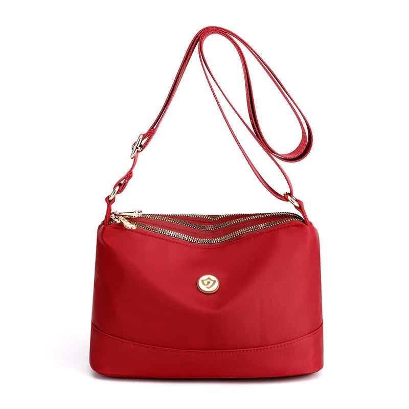 Minimalistisk axel- och crossbodyväska i nylon med stor kapacitet